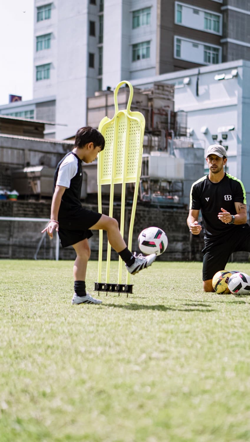 Touch past the mannequin · coach on the ball
