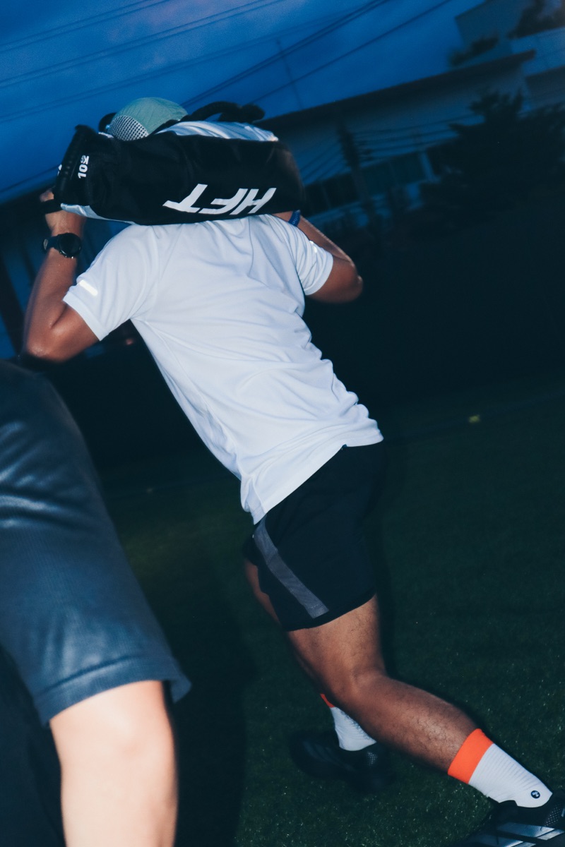 A sandbag across the shoulders